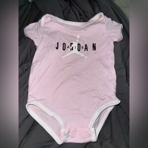 Jordan Pink Baby Onesie